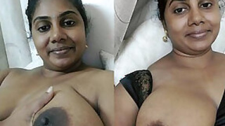 Desi chick showing her oversized boobies and then some