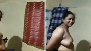 Desi man catches his fat wife with big XXX tits dressing for work