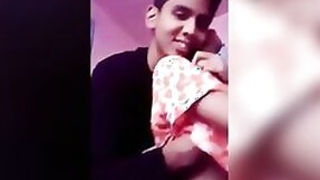 An adult teenage girl enjoying romantic home sex with her boyfriend