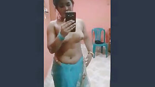 Chubby chick is ready to take off her sari and show her body