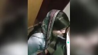 Dressed Desi Indian woman gets down on her knees to suck a meaty XXX sausage