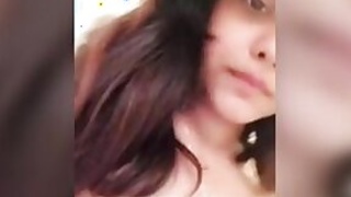 Desi's wife exposes naked breasts with pale nipples in MMC video