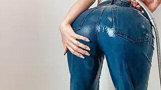 Soggy blue jeans and a wet top