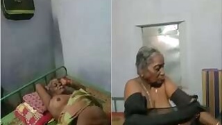 Mature couple showing tits and pussy